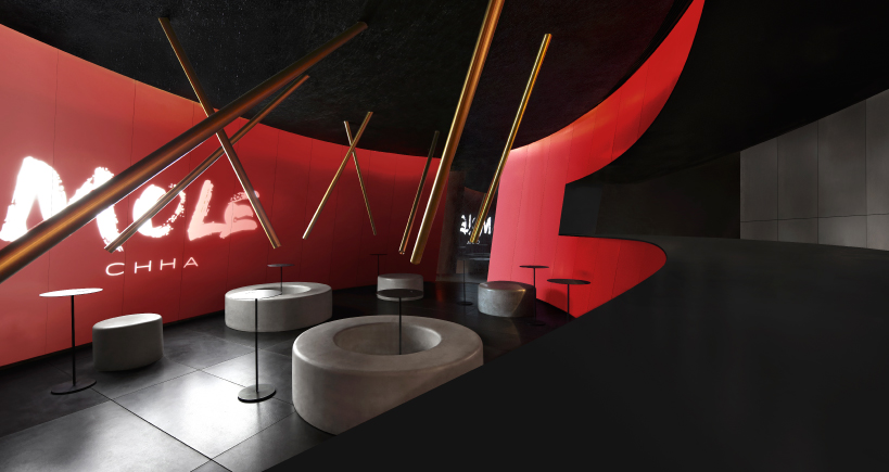 infinity nide's mole chha is a dome teahouse with red gradient walls and brass lighting tubes - 2