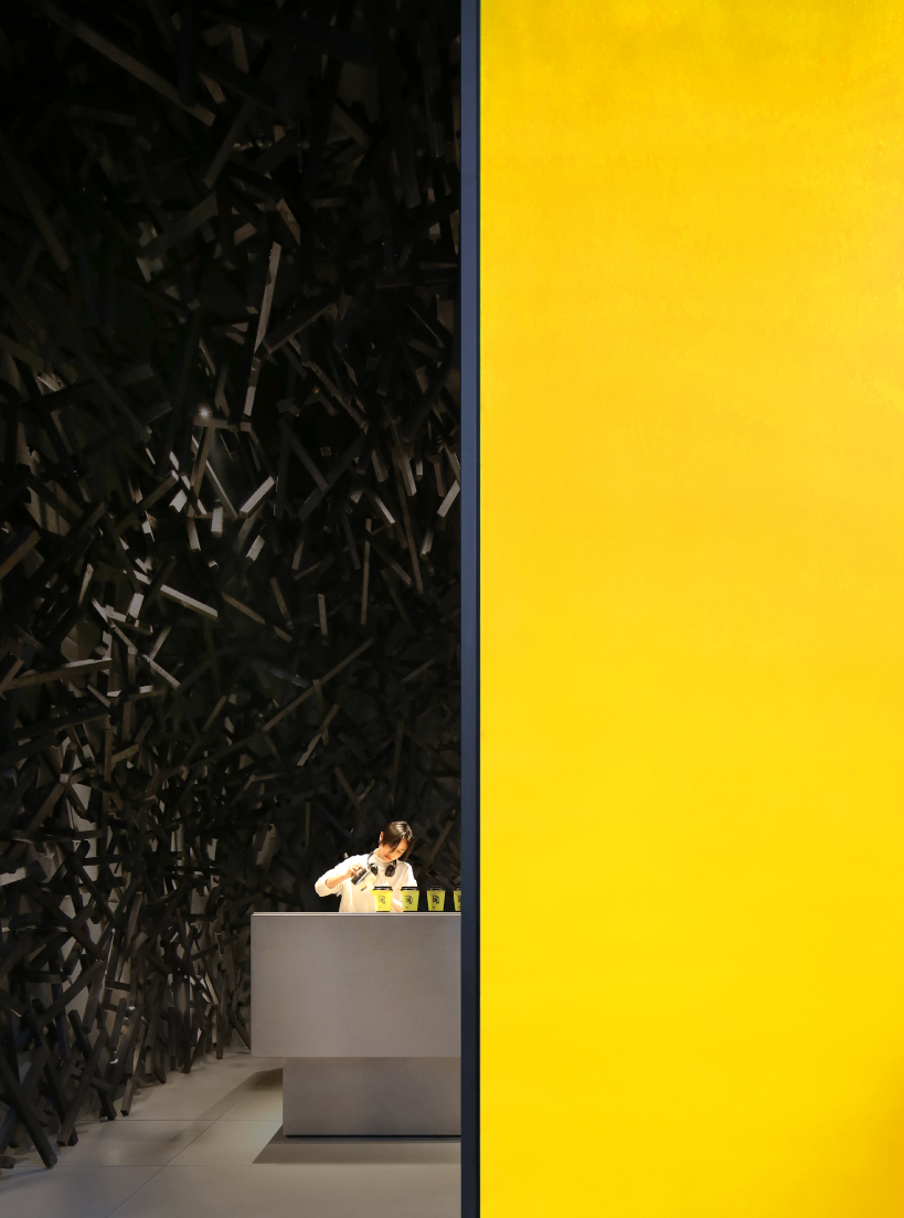 dim interior of infinity nide's café in china contrasts with bustling urban scene - 2
