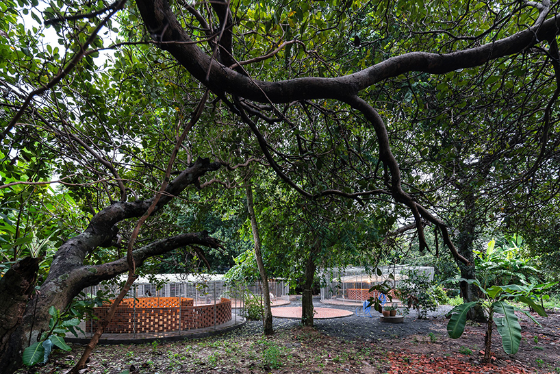 sawadeesign forms large circular enclosures for hoc mon pet shelter in vietnam designboom