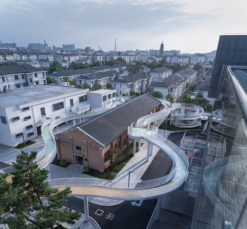 floating cloud corridor hovers above minax's factory renovation in china 