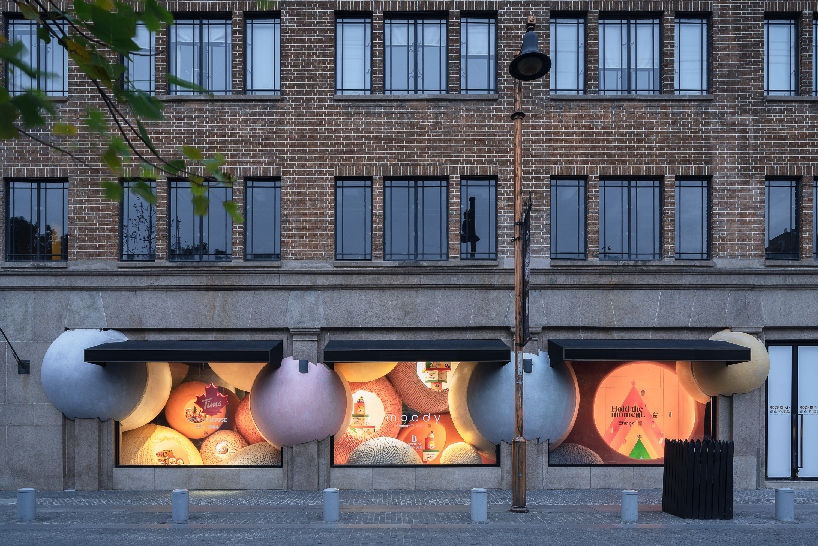 WAY studio creates a dreamy window display with gigantic balls of yarn in shanghai designboom
