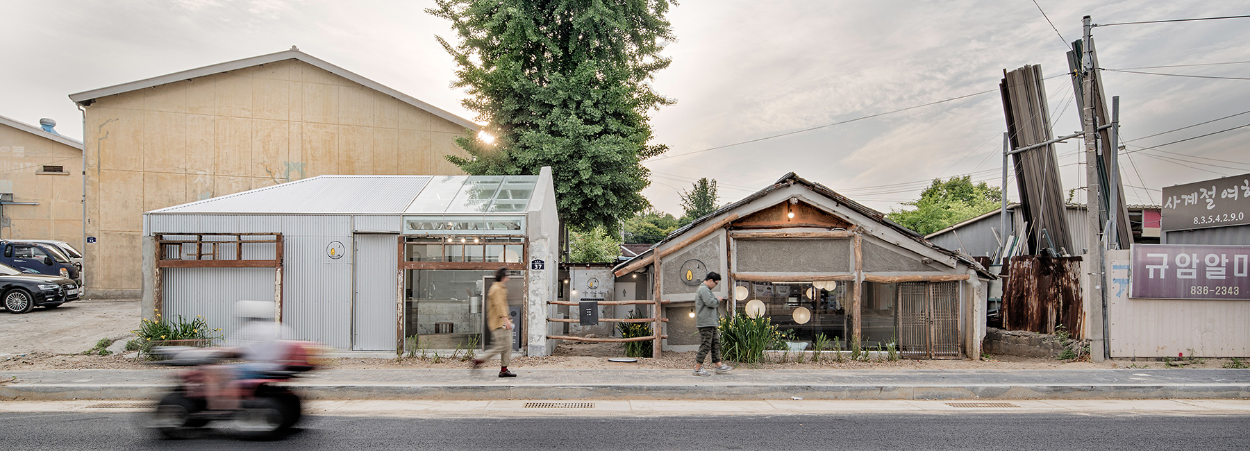 starsis upgrades two 60-year-old barns into a bar and cafe in korean suburbs