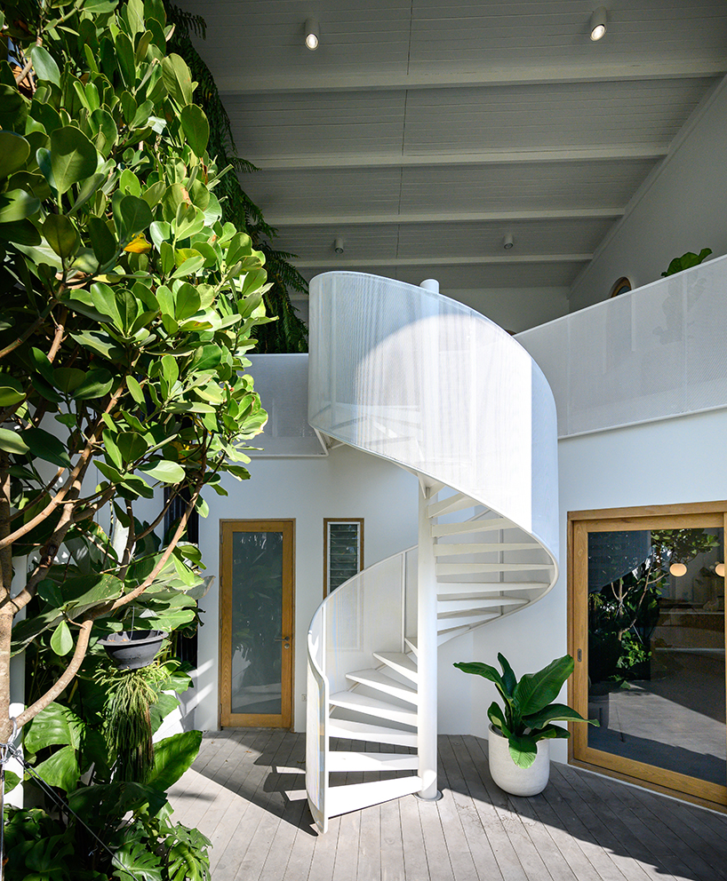 bodinchapa architects applies a translucent façade to house renovation in bangkok designboom