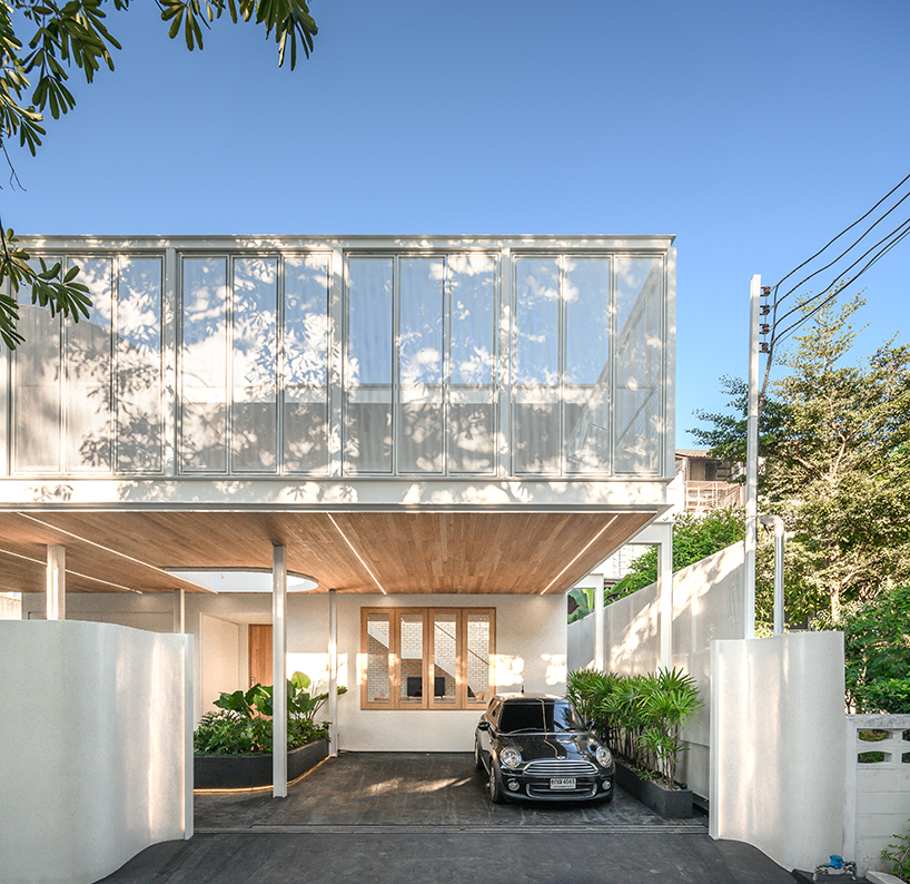 bodinchapa architects applies a translucent façade to house renovation in bangkok designboom