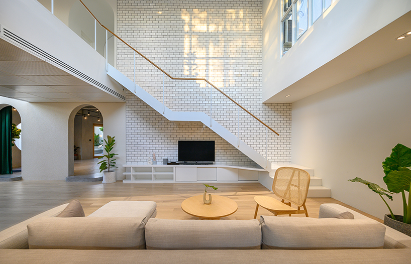 bodinchapa architects applies a translucent façade to house renovation in bangkok designboom