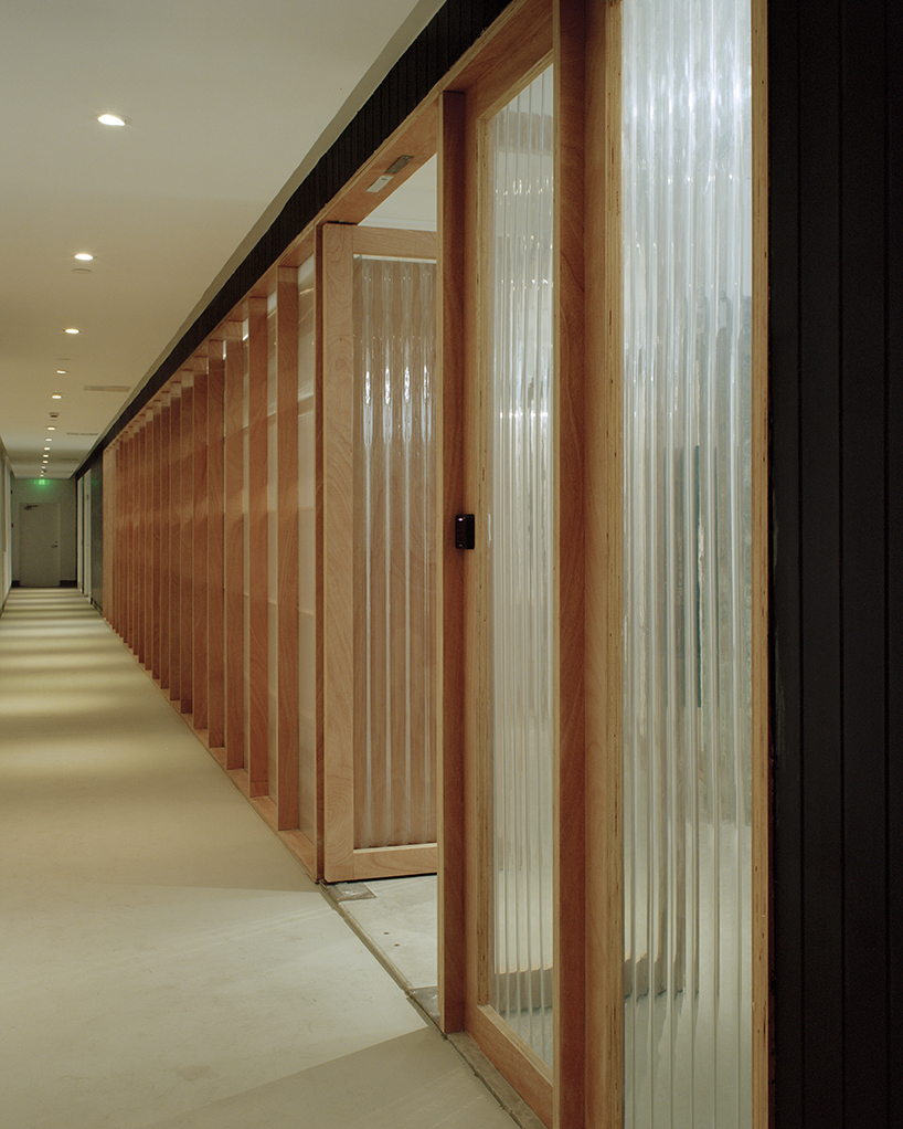 studio archive divides an office in shanghai by plywood-framed screens designboom