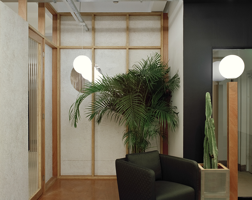 archive divides an office in shanghai with plywood-framed screens - 4