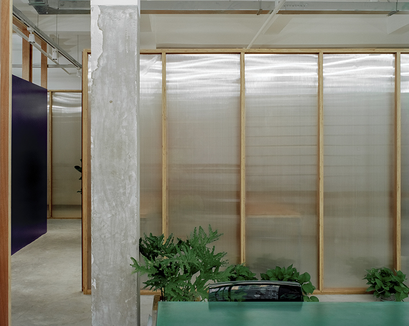 archive divides an office in shanghai with plywood-framed screens - 6