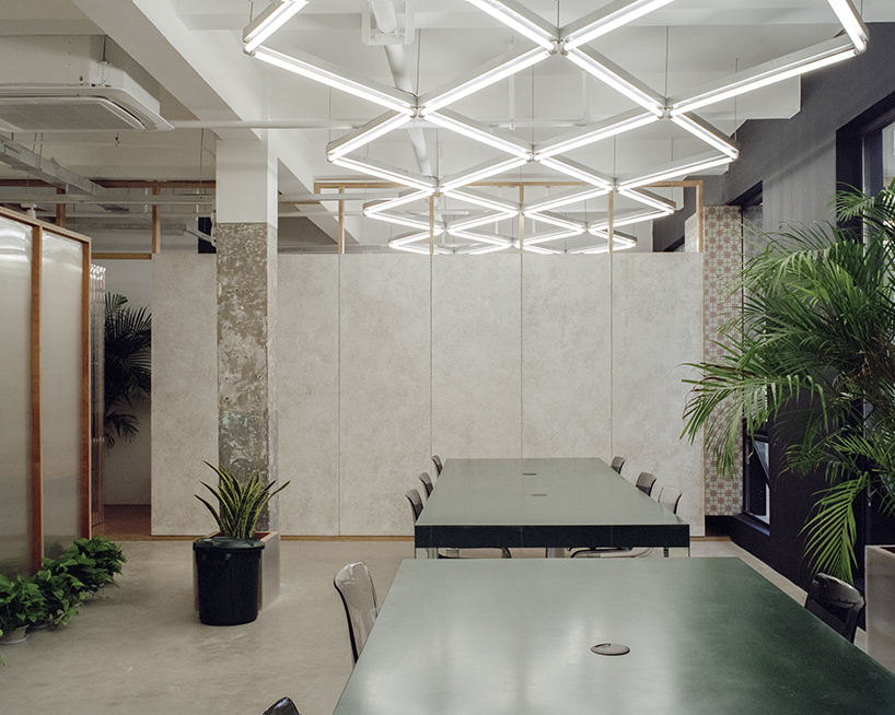 archive divides an office in shanghai with plywood-framed screens - 1