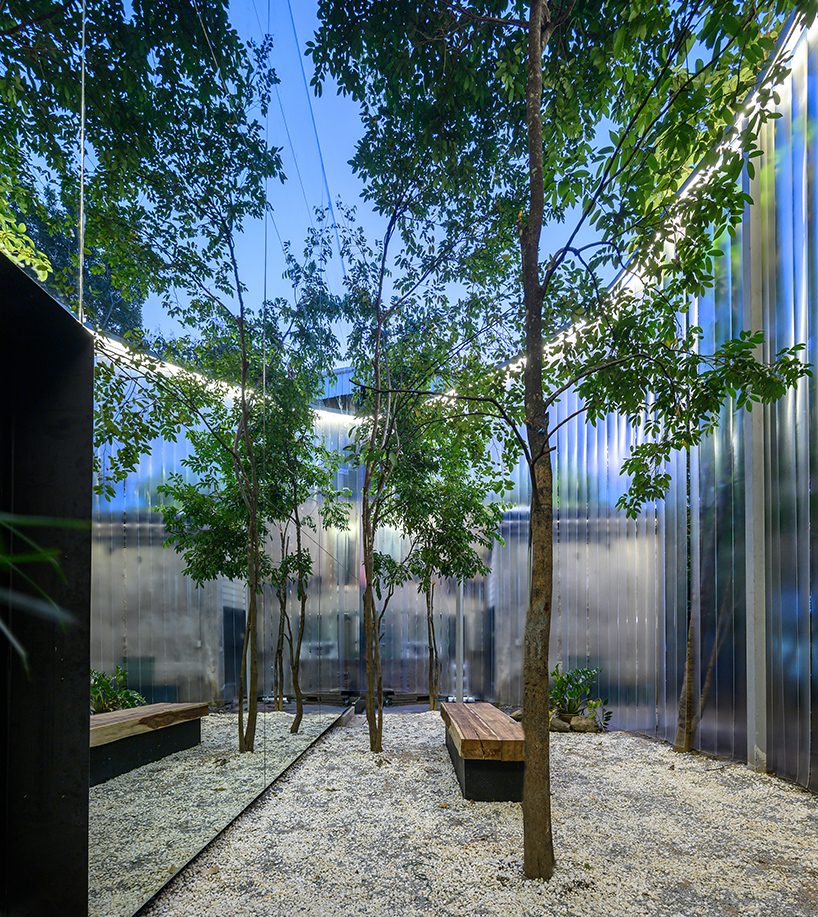 sher-maker-boonma-studio-cafe-plastic-curtain-chiangmai-thailand-12-30-2019-designboom