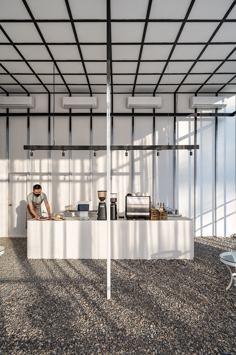 sher maker wraps curtains around a multifunctional space in chiangmai designboom