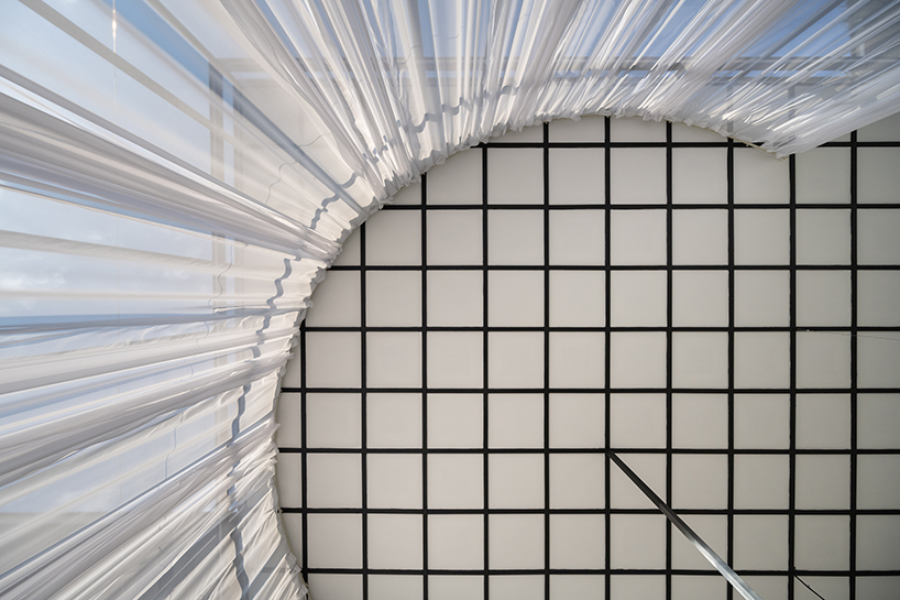 sher maker wraps curtains around a multifunctional space in chiangmai designboom