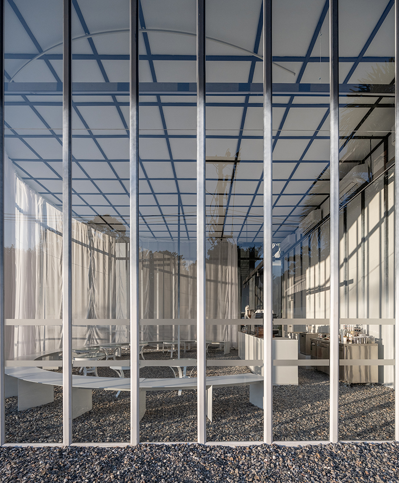 sher maker wraps curtains around a multifunctional space in chiangmai designboom