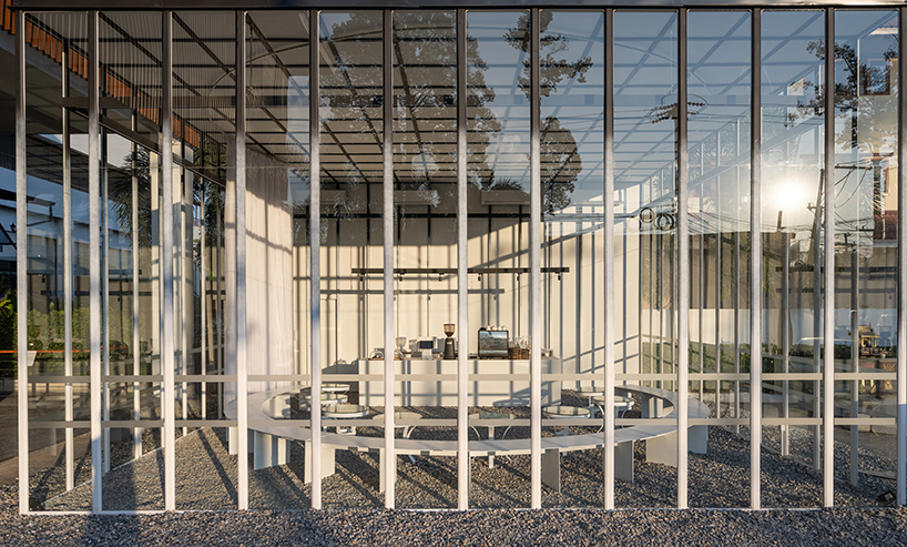 sher maker wraps curtains around a multifunctional space in chiangmai designboom