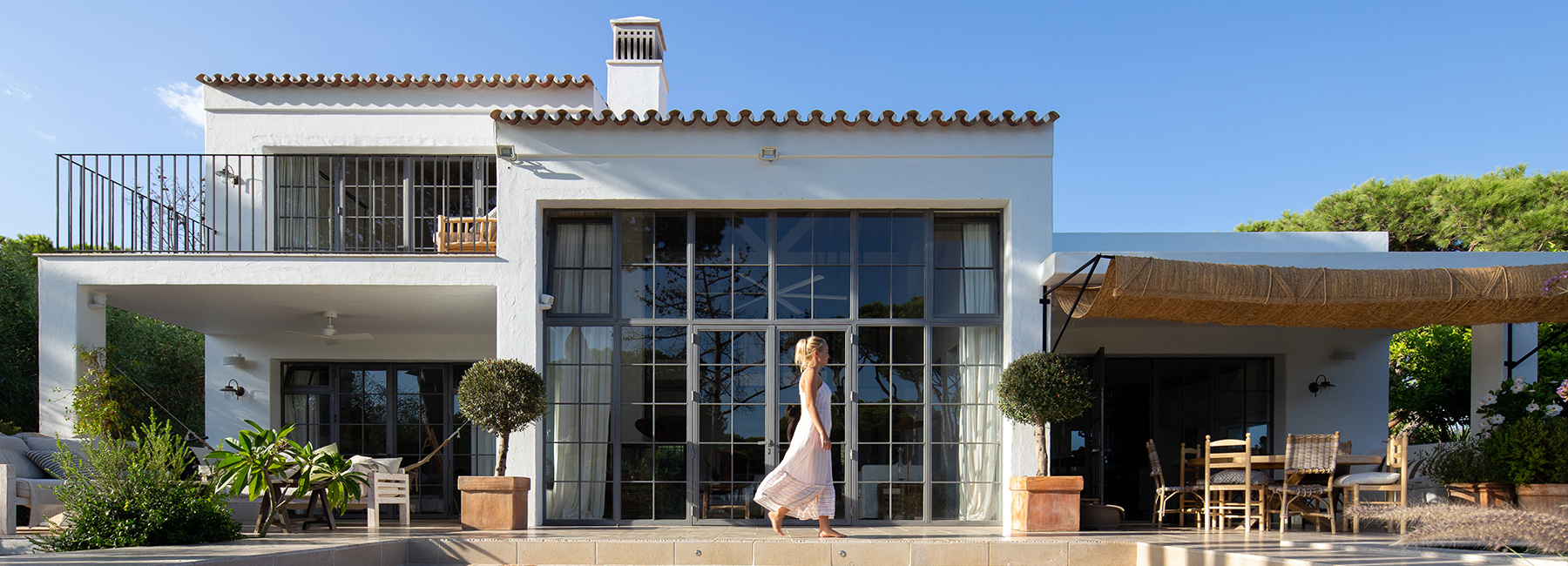 CORE architects uses rustic materials to refurbish beach house in portugal