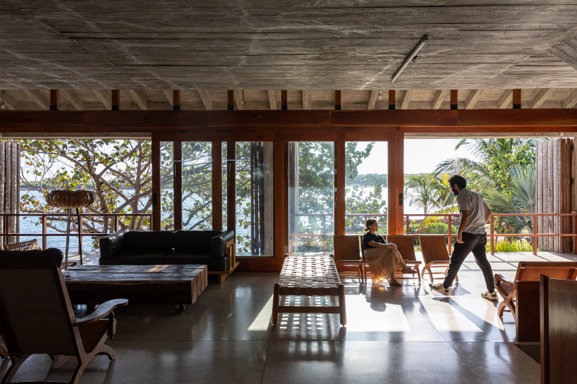 palm wood skin shields residence + portico structure by infraestudio in havana