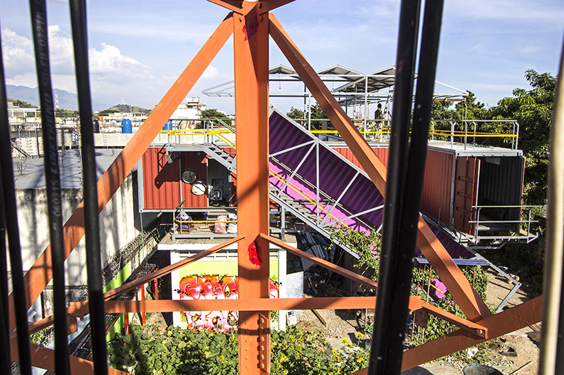 pico colectivo stacks shipping containers to make cultural center in venezuela