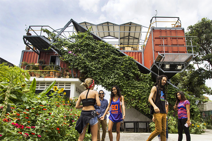 pico colectivo stacks shipping containers to make cultural center in venezuela