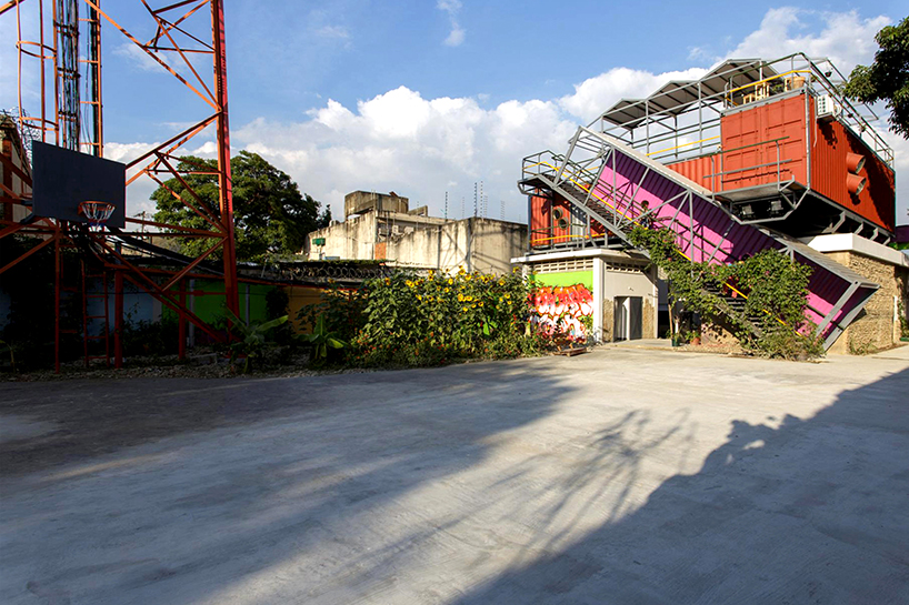 pico colectivo stacks shipping containers to make cultural center in venezuela