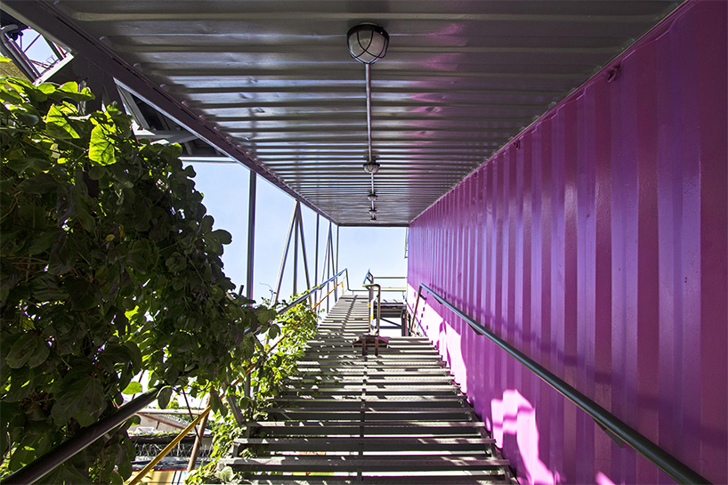 pico colectivo stacks shipping containers to make cultural center in venezuela