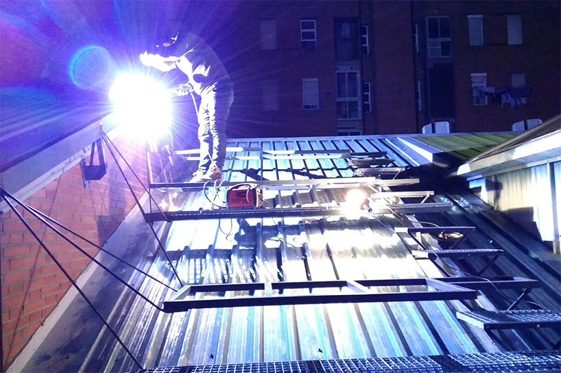 pico colectivo implant on the roof exstand a madrid warehouse by building a gathering spot on the roof designboom