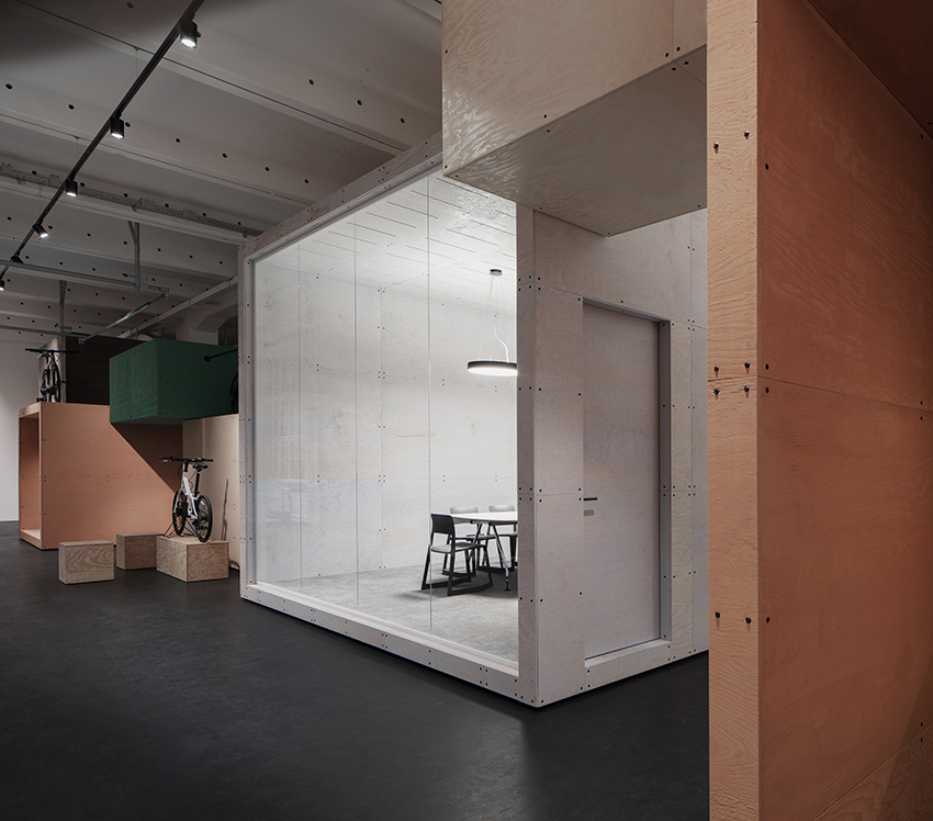 naice stacks wooden volumes inside old berlin factory for urban mobility startup’s offices - 1