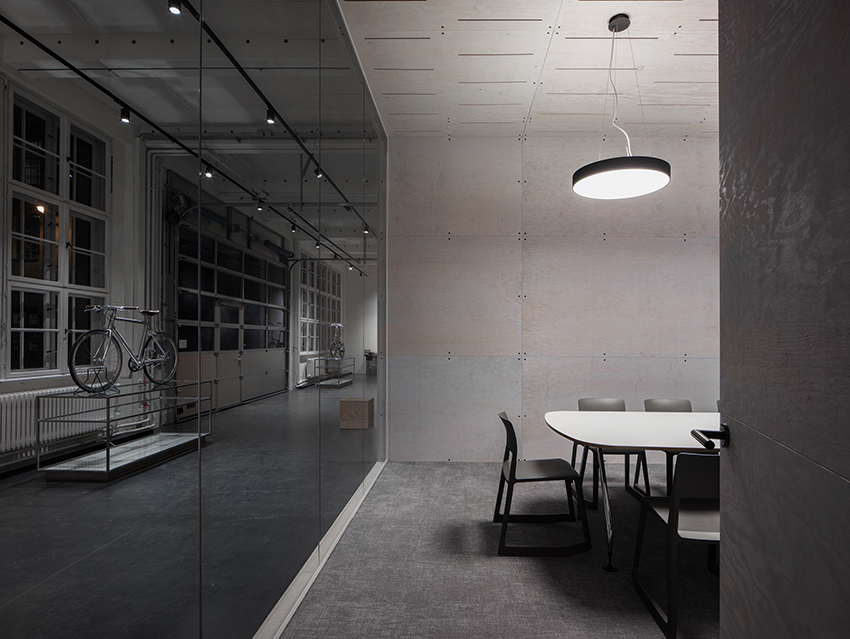 naice stacks wooden volumes inside old berlin factory for urban mobility startup’s offices - 2