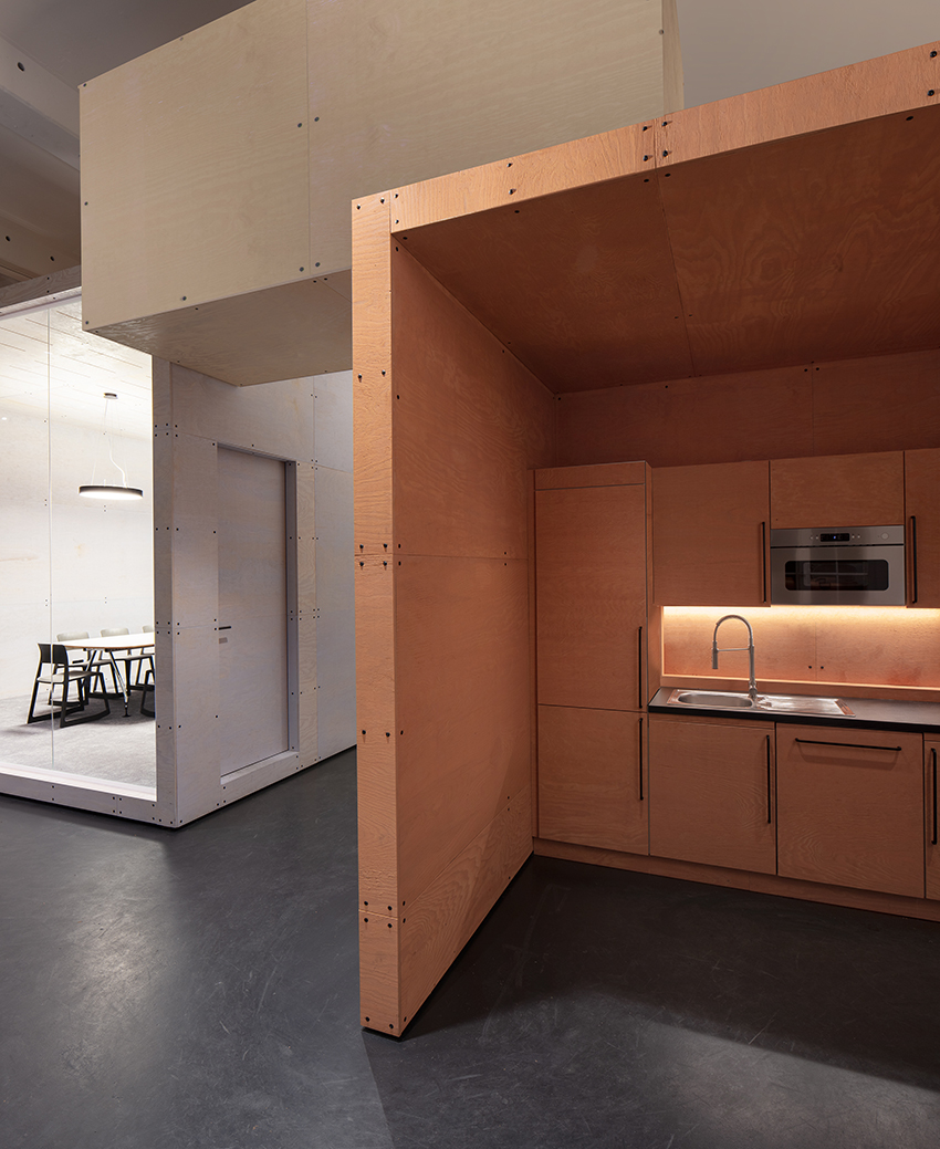 naice stacks wooden volumes inside old berlin factory for urban mobility startup’s offices - 3