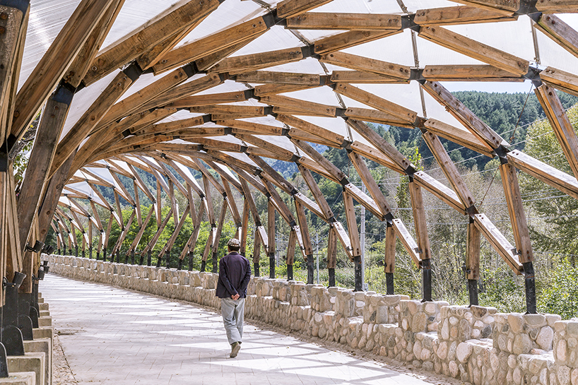 LUO reuses leftover materials of renovated chinese village to build a pergola for locals designboom