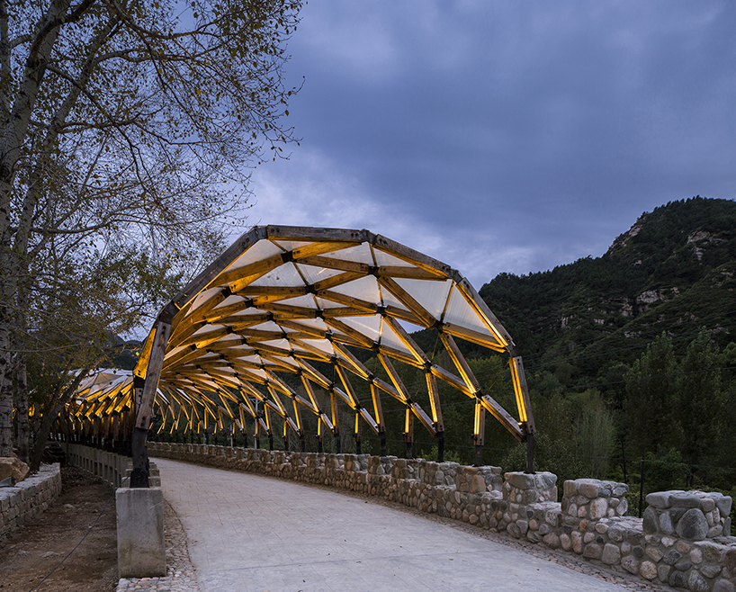 LUO reuses leftover materials of renovated chinese village to build a pergola for locals designboom