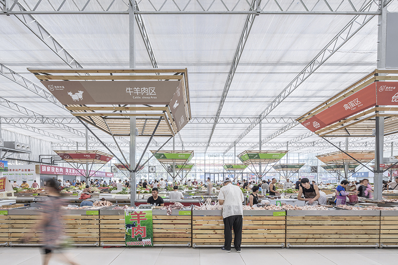 LUO studio prefabricates modular components to build a temporary indoor market in china designboom