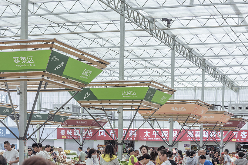 LUO studio prefabricates modular components to build a temporary indoor market in china designboom