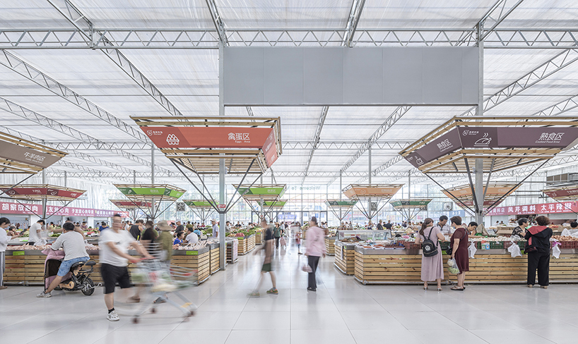 LUO studio prefabricates modular components to build a temporary indoor market in china designboom