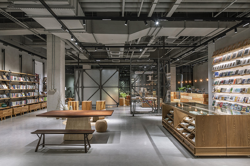 transparent rotating walls + exposed pipes assemble LUO studio's flexible bookstore space
