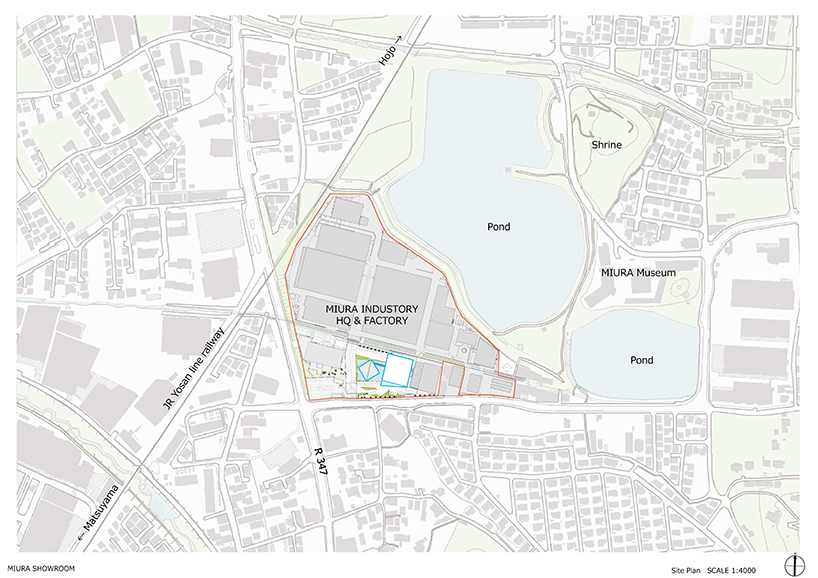 this transparent showroom in japan is surrounded by an artificial pond takenaka designboom