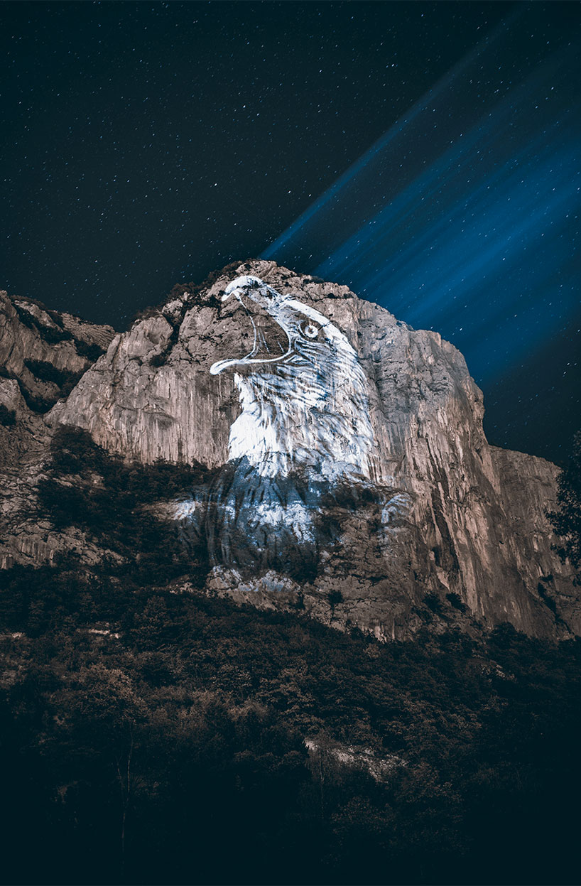 julien nonnon raises awareness by projecting endangered animals onto alpine mountains