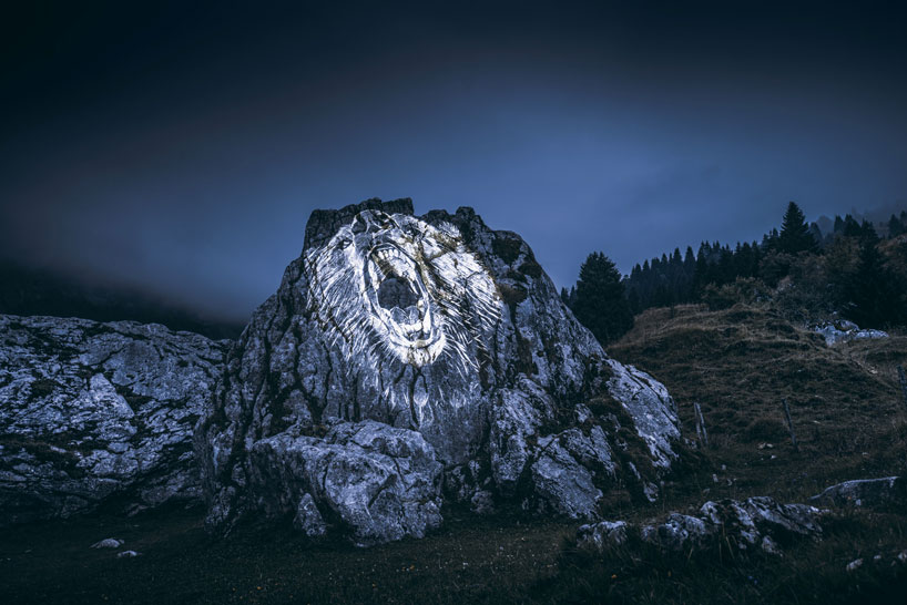 julien nonnon raises awareness by projecting endangered animals onto alpine mountains