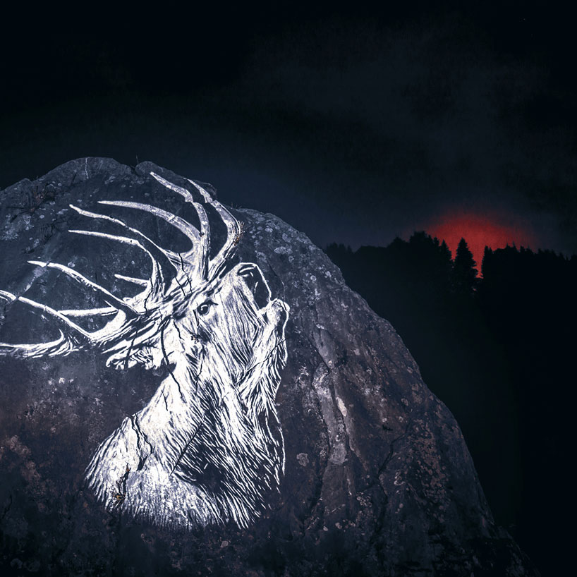 julien nonnon raises awareness by projecting endangered animals onto alpine mountains
