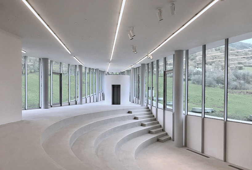 kaloustian's 'smart center' embraces the landscape of armenia in smooth, organic form