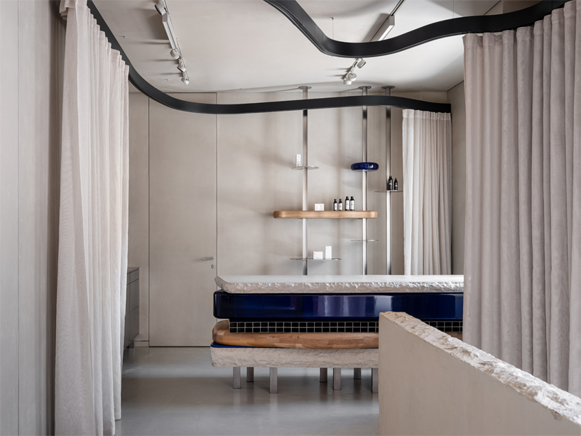 da bureau combines metal, wood and mirrors for serdar kambarov studio's interiors in moscow