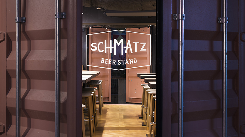 I IN repurposes a shipping container to form the SCHMATZ beer stand in tokyo designboom