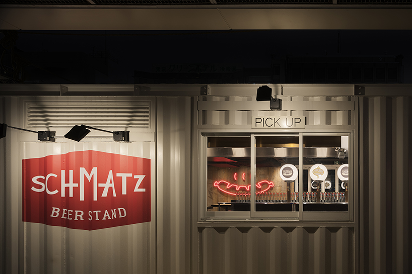 I IN repurposes a shipping container to form the SCHMATZ beer stand in tokyo designboom