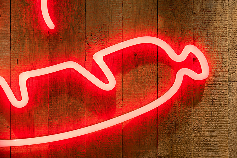 I IN repurposes a shipping container to form the SCHMATZ beer stand in tokyo designboom