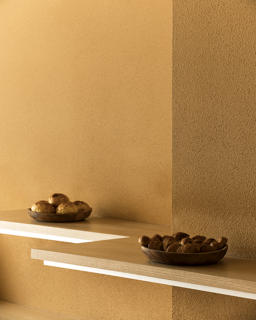 the color of baked bread adorns the façade of I IN's pinocchio bakery in japan designboom