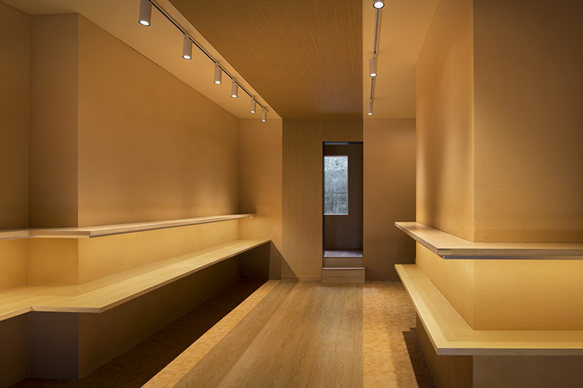 the color of baked bread adorns the façade of I IN's pinocchio bakery in japan designboom