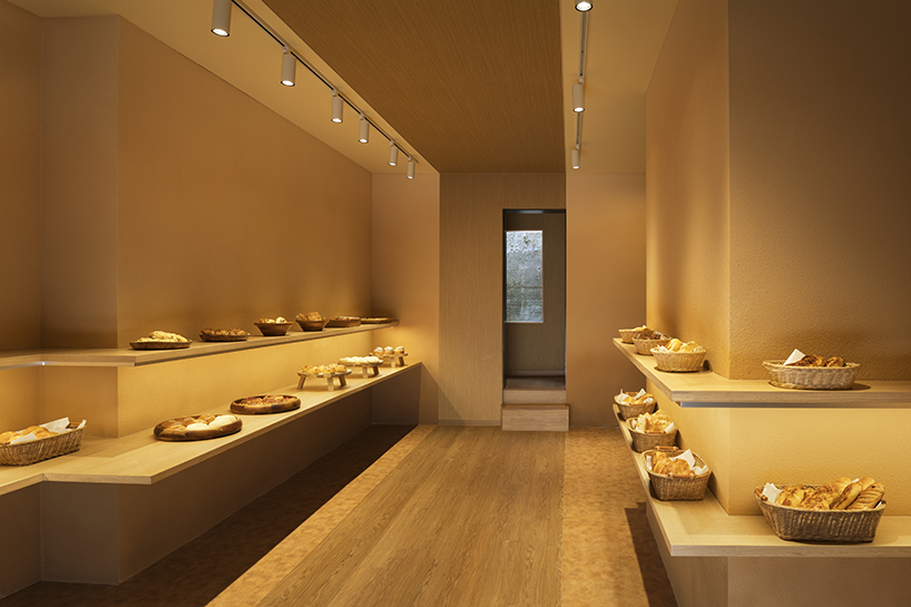 the color of baked bread adorns the façade of I IN's pinocchio bakery in japan designboom