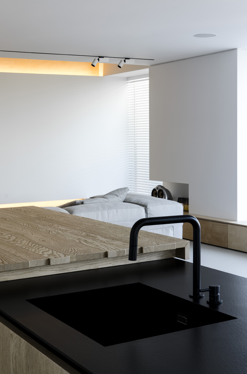 line architects creates 'soft loft' interior in moldova using subtle contrasts