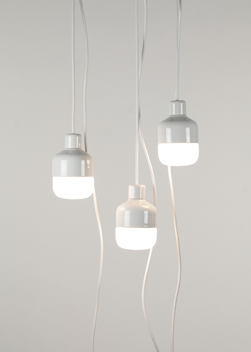 kauppi & kauppi designs a splash proof porcelain pendant for ifö electric designboom