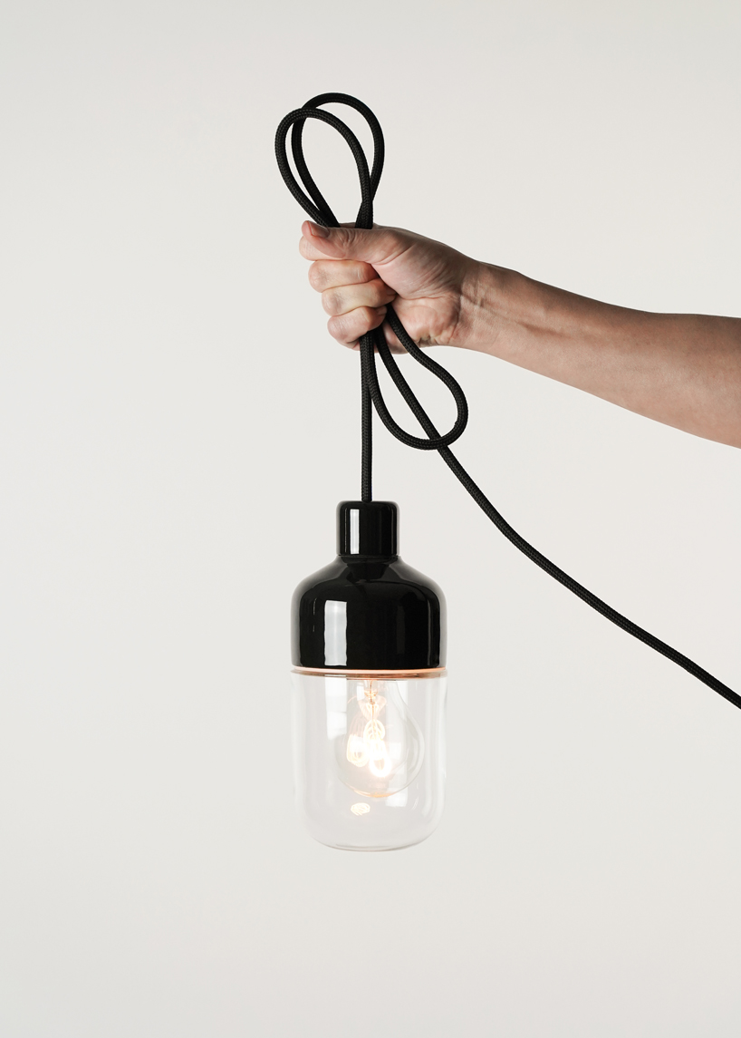 kauppi & kauppi designs a splash proof porcelain pendant for ifö electric designboom