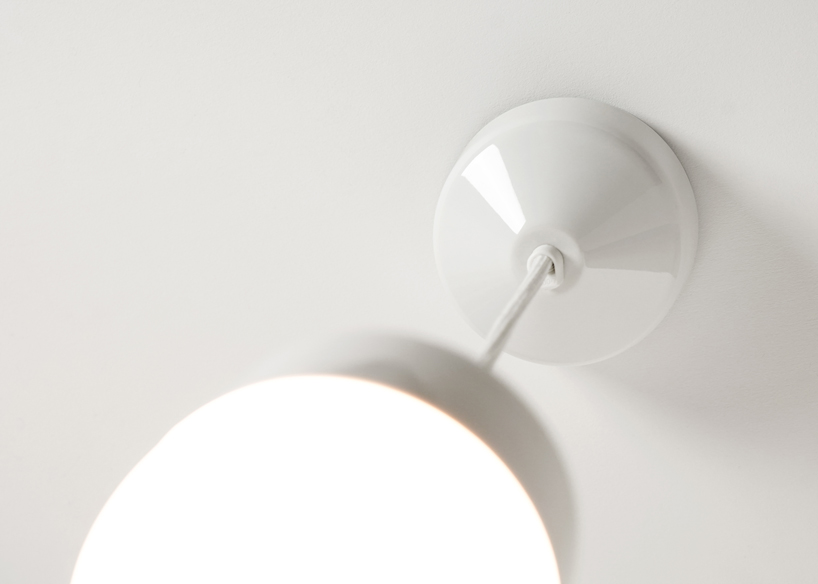 kauppi & kauppi designs a splash proof porcelain pendant for ifö electric designboom